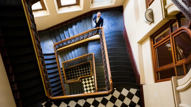 Staircases in the historic building are currently covered in black lino, but underneath reveal "wonderful pressed patterns based on Australian plants."