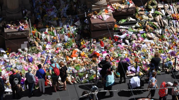 Floral tributes at the Bourke Street Mall. 