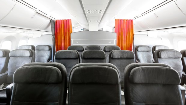 There are just 21 seats in three rows in the business cabin.