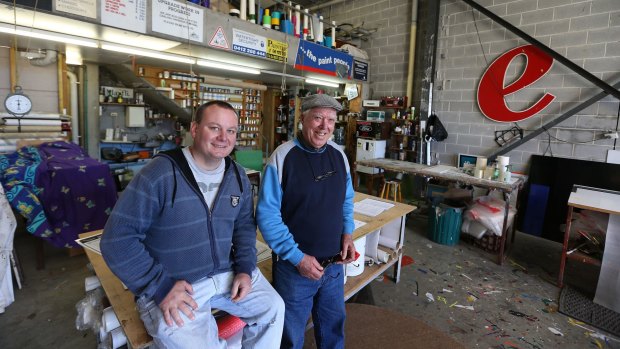 Vendors Fred and Peter Dowling inside their warehouse after the auction.
