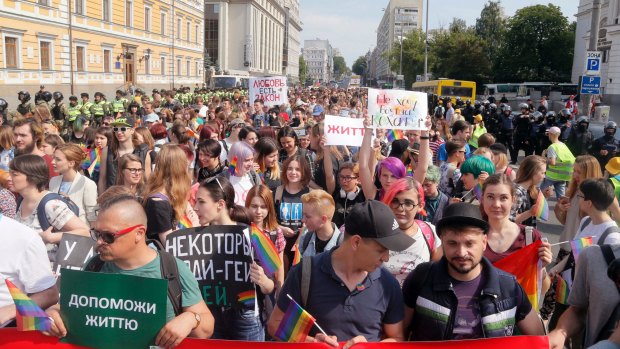 Gay and lesbian rights activists demonstrate in the streets of the capital during the annual Gay Pride parade in Kiev.