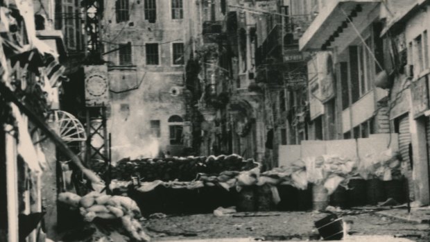 Sandbags divide a street in the Bab Idriss area of Beirut in April 1976, a year after the war began. 