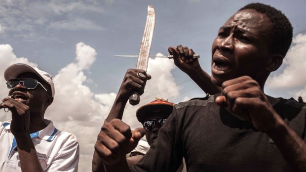 Demonstrators protest  against the recent coup in  Ouagadougou on Saturday.