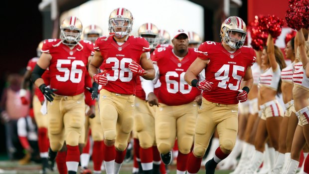 On the big stage: Jarryd Hayne and the San Francisco 49ers run onto the field at Levi's Stadium.