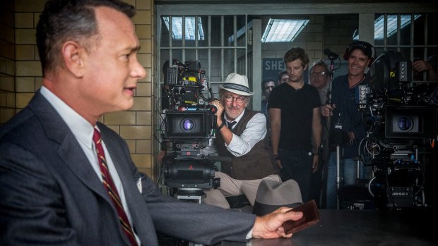 Steven Spielberg directs Tom Hanks on the set of <i>Bridge of Spies</i>. 