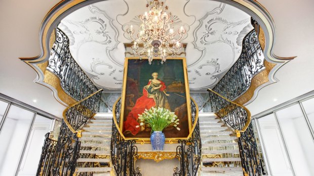 The lobby of Maria Theresa, with a portrait of the Austrian empress.