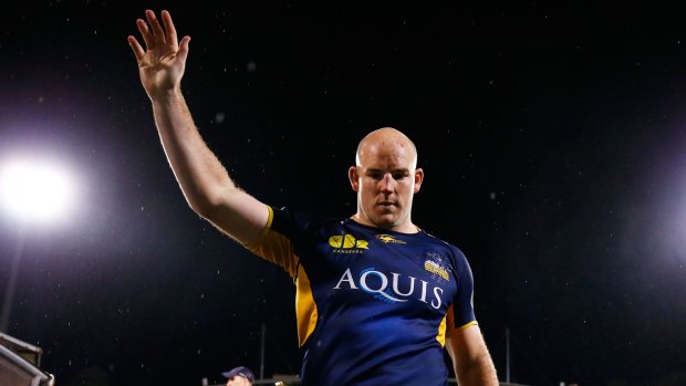 Sad farewell: Stephen Moore leaves the field for the last time as a Brumbies player.