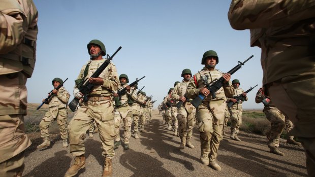 Australian troops are training Iraqi soldiers for the fight against the so-called Islamic State, helping improve the Iraqis' basic skills such as marksmanship, combat tactics and leadership.