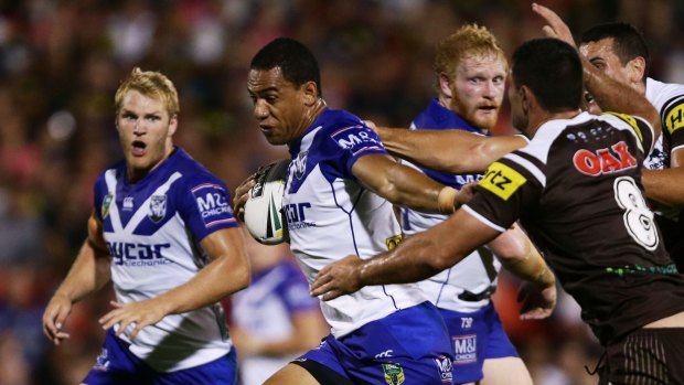 Where there's a Will: Fullback Will Hopoate makes a break at the Bulldogs.