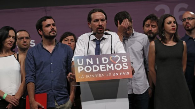 Dejected supporters of the anti-austerity Unidos Podemos coalition at a news conference in Madrid following the results.