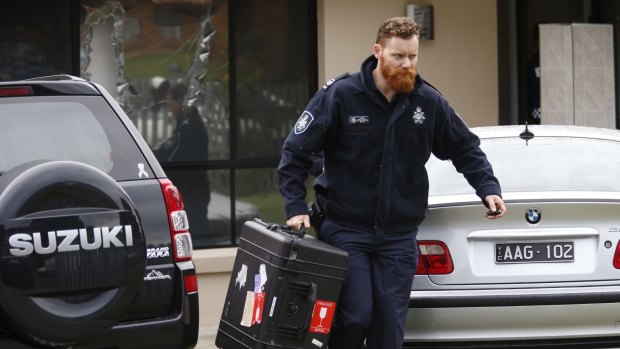 Police conduct terror raids in Hallam, Melbourne, on April 18.