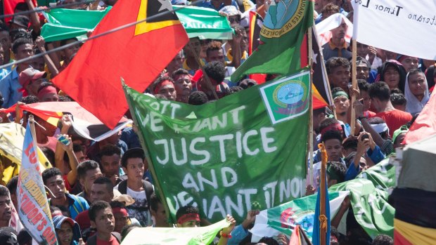 Protesters in Dili last month demanded that Australia negotiate over the Timor Sea boundary.
