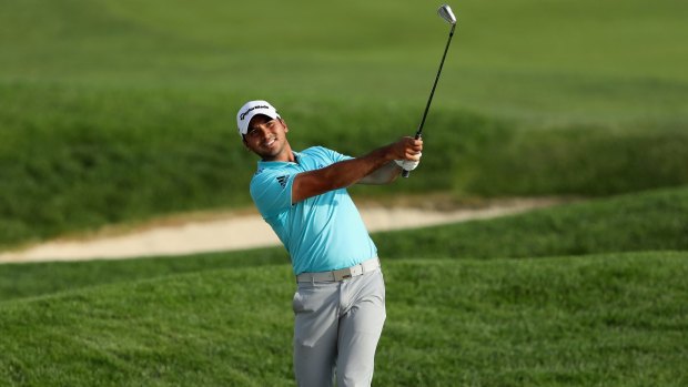 In pursuit: Jason Day began the final day's play a few shots off the lead.