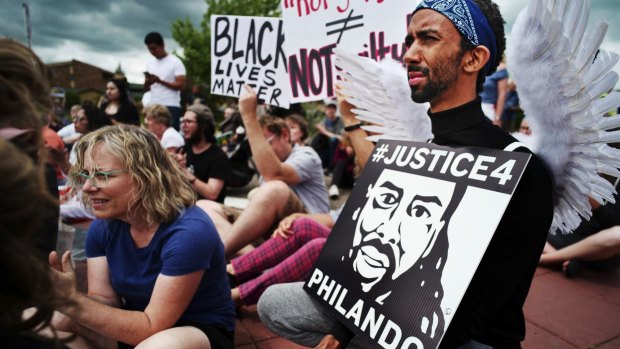 Protesters in St Anthony, Minnesota, in June after the verdict in the Philando Castile case.