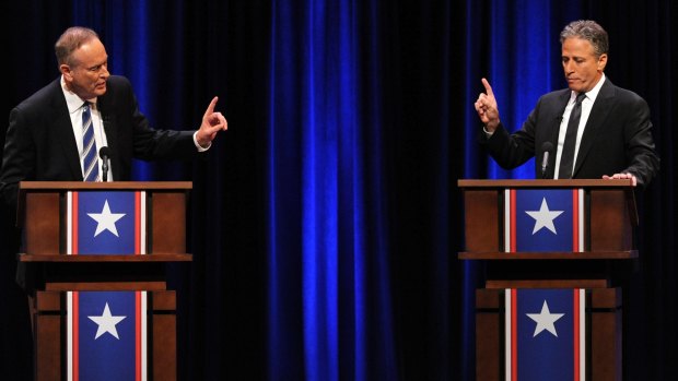 Jon Stewart faces off with Fox presenter Bill O'Reilly in the 2012 Rumble In The Air-Conditioned Auditorium.