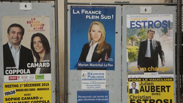Posters for the regional elections on display at a polling station last weekend.