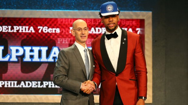 No.3 pick: Jahlil Okafor poses with NBA Commissioner Adam Silver after being selected by the Philadelphia 76ers.