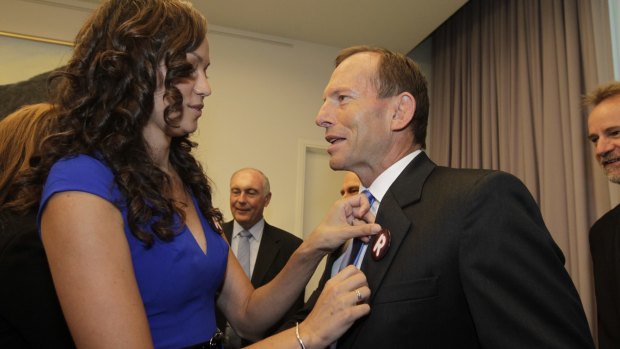 Carla McGrath, seen here with then opposition leader Tony Abbott in 2013, has been appointed to the Australian Press Council.