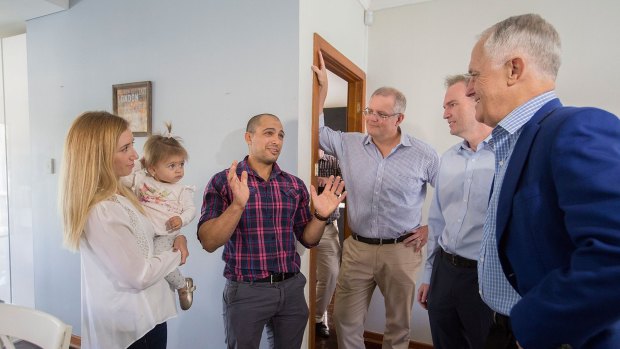 Kim and Julian Mignacca and 11-month-old daughter Addison talk to Malcolm Turnbull, Scott Morrison and local MP David Coleman about their home in Penshurst, Sydney.