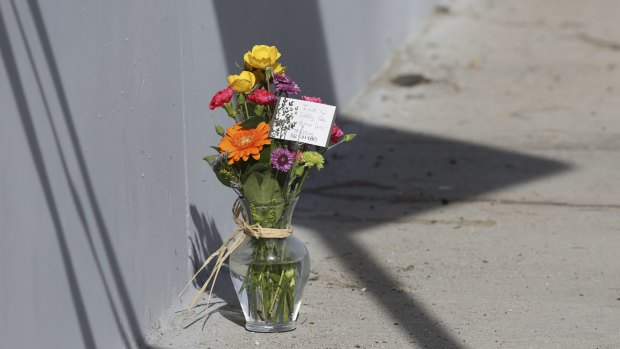 A makeshift memorial near the police perimeter of Wednesday's mass shooting.