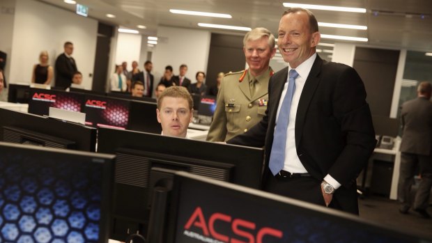 Mr Abbott on a tour of the new centre.