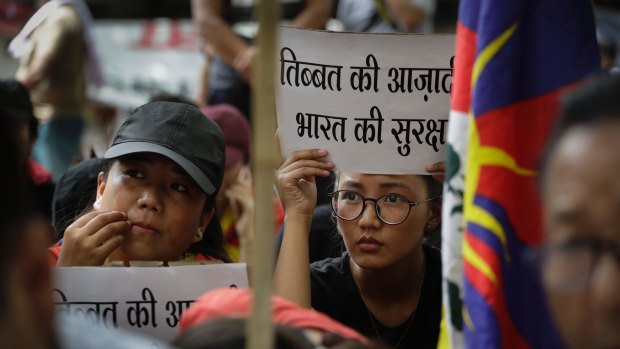 Exile Tibetans in New Delhi join a protest to show support for India in Doklam stand-off.