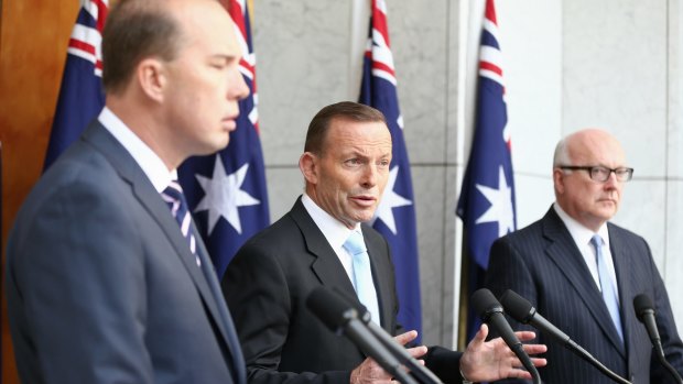Prime Minister Tony Abbott, pictured with Peter Dutton and George Brandis, stepped up his attack on the ABC on Thursday.