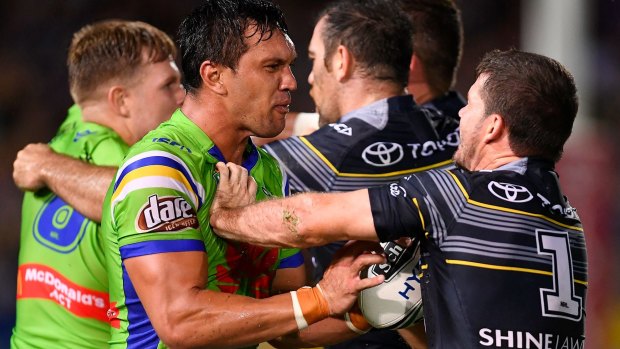 Jordan Rapana of the Raiders gets involved in a melee with Cowboy Lachlan Coote.  