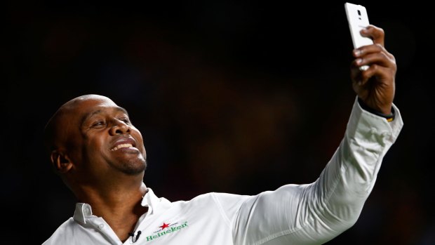 Gentle giant: Former New Zealand All Blacks winger Jonah Lomu takes a selfie during the 2015 Rugby World Cup final between New Zealand and Australia at Twickenham.