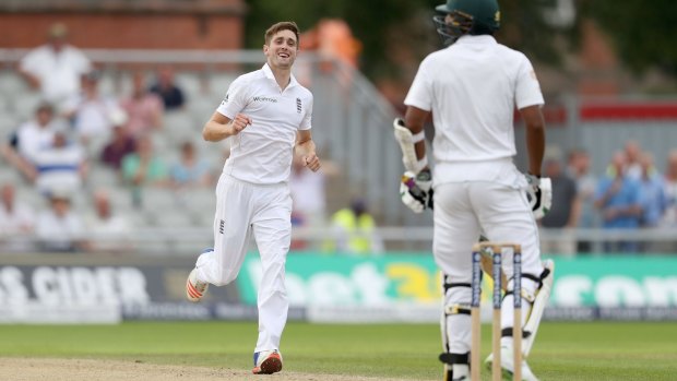 That's out: England's Chris Woakes celebrates taking the wicket of Pakistan's Rahat Ali.
