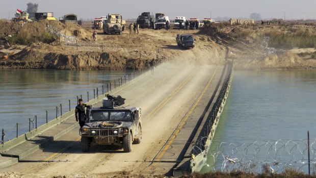 Iraqi forces cross the Euphrates in the advance to Ramadi.