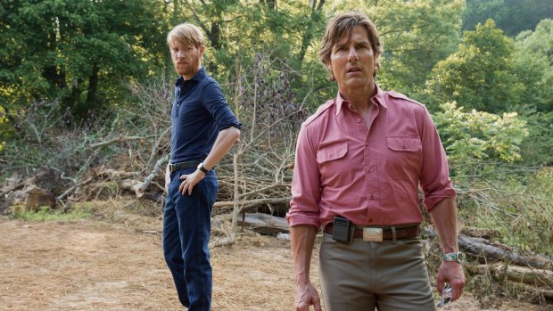 Deft black comedy: Tom Cruise with Domhnall Gleeson (left) in 'American Made'.