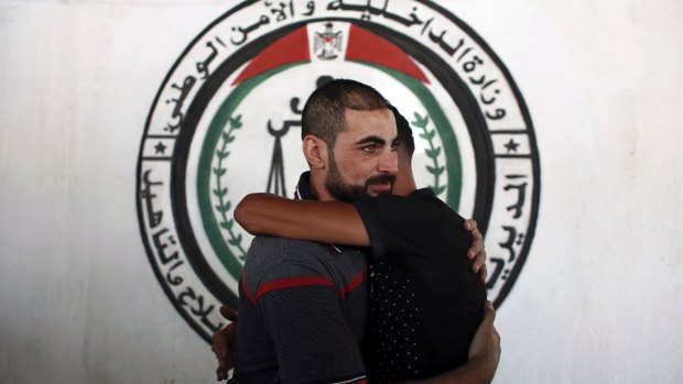A Palestinian Fatah member is welcomed after being released from a Hamas jail in front of the interior ministry, in Gaza City on Sunday.