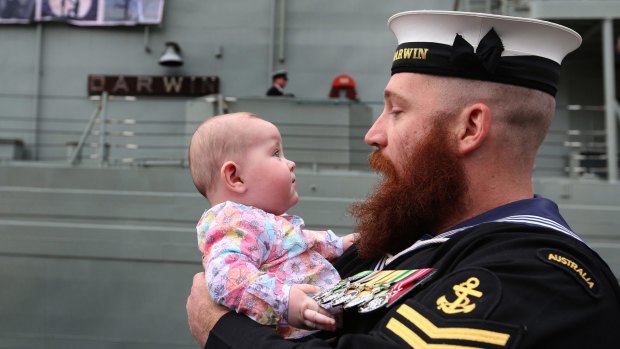 Seaman Brent Anschaw and baby Olivia.