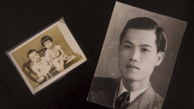 A photo of Guo Ching, right, a victim of the political repression known as the White Terror, and a photo of his children, at the National Human Rights Museum in Taiwan.