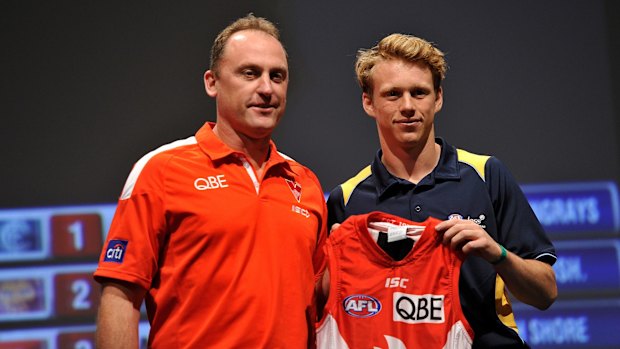 Swans coach John Longmire with draft pick number 3 Callum Mills.