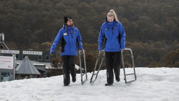 Lift operators prepare for the opening of ski season at Thredbo.