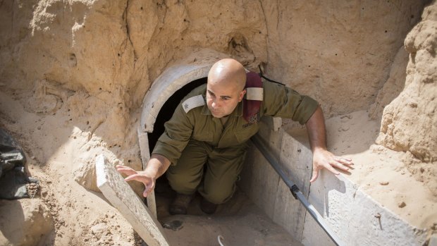 An Israeli soldier inside a tunnel built by Hamas militants leading from the Gaza Strip into southern Israel in 2014. 