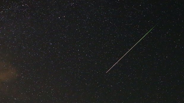 A meteor streaks across the sky near Kraljevine, Bosnia and Herzegovina early on Wednesday morning. The annual Perseid meteor shower reaches its peak on Wednesday and Thursday, according to NASA. 