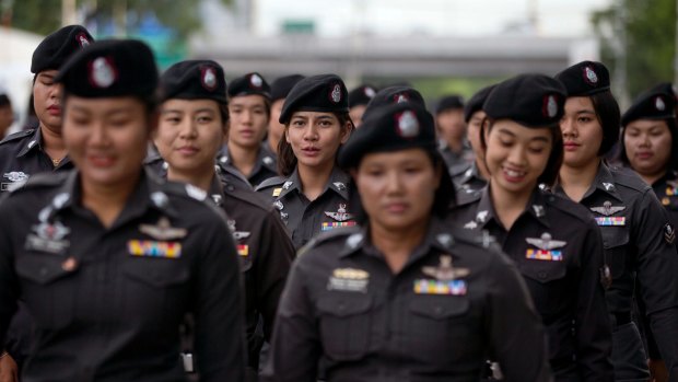 Police officers deploy outside the Thai Supreme Court ahead of ascheduled  verdict on charges accusing former Prime Minister Yingluck Shinawatra of negligence in implementing a rice subsidy.