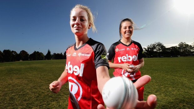 Melbourne Renegades players Dani Wyatt (left) and Molly Strano. Due to a quirky commercial deal signed off by Cricket Australia, sports editors and producers are being forced to leap several hurdles to access photos from WBBL matches.