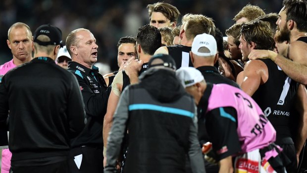 Port Adelaide coach Ken Hinkley attempts to push his players to perform better.