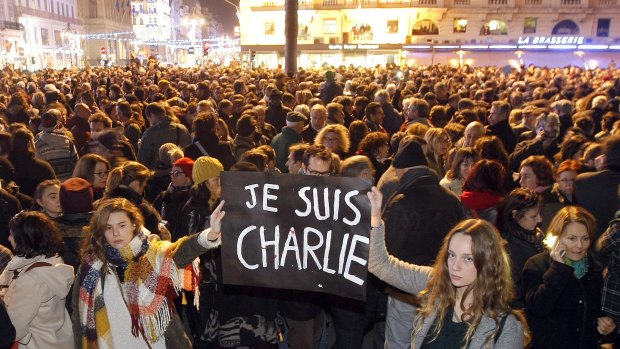 Demonstrators hold a banner reading 'I am Charlie', at the Old Port of Marseille, southern France. 