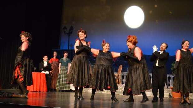 Louise Keast, left,  as the Widow and the Cancan girls in <i>The Merry Widow from Bluegum Creek</i>.