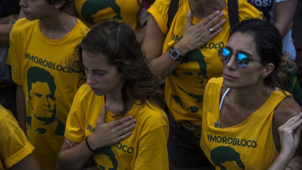Demonstrators wearing t-shirts with the image of Brazilian Federal Judge Sergio Moro, during an anti-corruption protest in Rio de Janeiro.