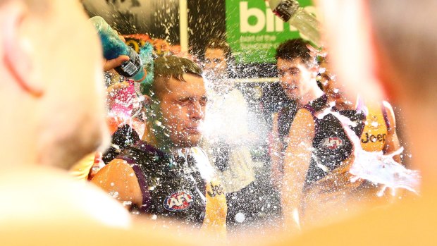 Tiger time: Richmond celebrate in the rooms on Saturday night.
