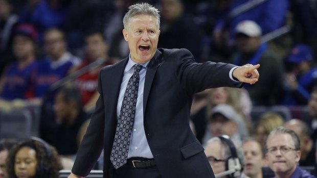 Getting his point across: Philadelphia coach Brett Brown barks instructions during a win in Detroit.