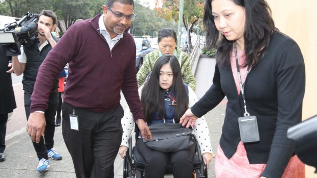  Yinuo "Ginger" Jiang, who broke both her legs when she jumped from her burning unit in Bankstown, at the Glebe Coroner's Court on Monday.