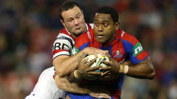 Searching for a break: Knights winger Akuila Uate.