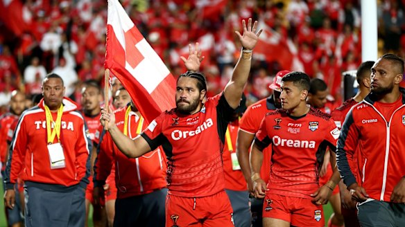 Rare occasion: Konrad Hurrell of Tonga leads his team around the ground thanking supporters.